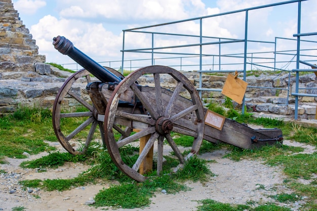 Photo of old ancient cannon in castle in KamyanetsPodilsky