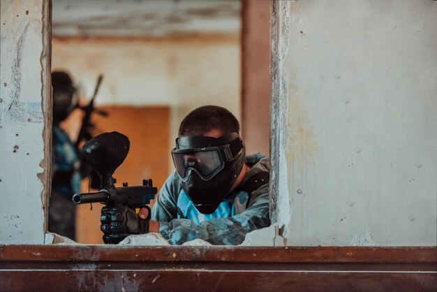 Photo of a paintball team in action with professional equipmentSelective focus Highquality photo