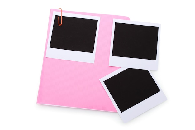 Photo photo papers and pink notebook isolated on white