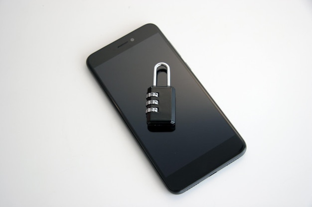 Photo password lock on the black phone screen Security phone vulnerability concept