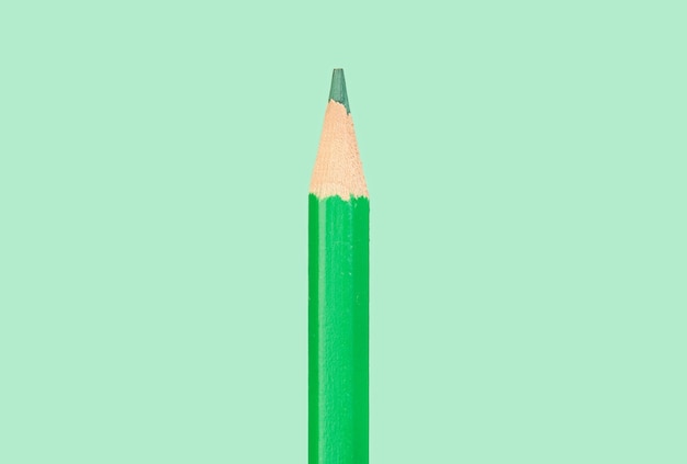 Photo photo of a pencil on a green background