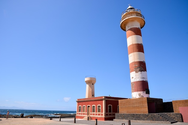 Photo Picture of an Old Lighthouse near the Sea