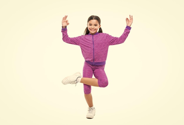 Photo of positive teen yoga girl has meditation in sportswear teen yoga girl has meditation