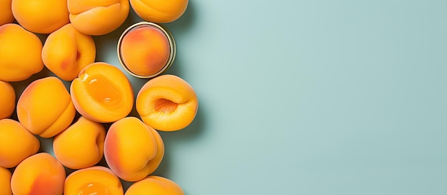 Photo of ripe peaches on a vibrant blue background with copy space