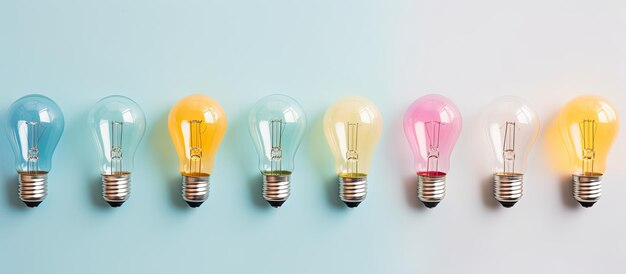 Photo of a row of illuminated light bulbs with copy space