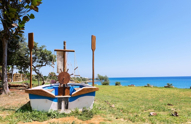 Photo of a sailor boat on a beach in protaras, Cyprus island