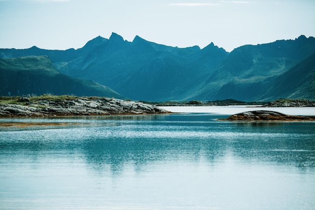 Photo of sea sandy shore sky in Norway on summer