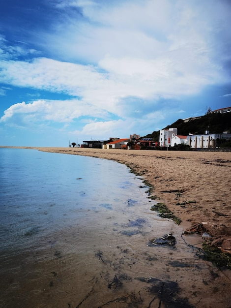 Photo of seaside beach in a small village