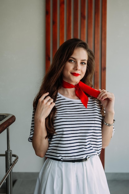A photo shoot of an adult girl in a pioneer tie 4168