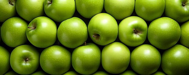 Photo shot of fresh green apples filling the entire frame suitable for wallpaper