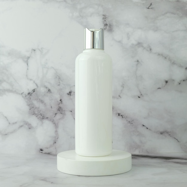 photo skin care cosmetic white flip top bottle product on white podium with marble background