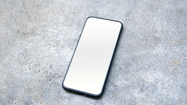 photo of smartphone on the concrete background