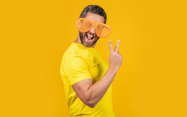 Photo of smiling party man in summer glasses piece party man in summer glasses
