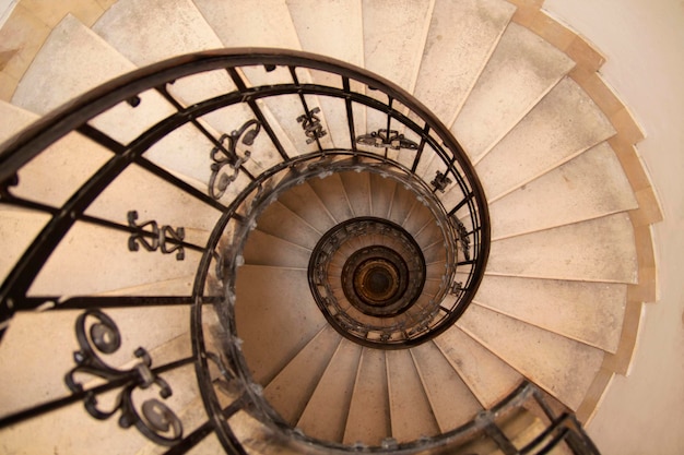 Photo of a spiral staircase in an old house