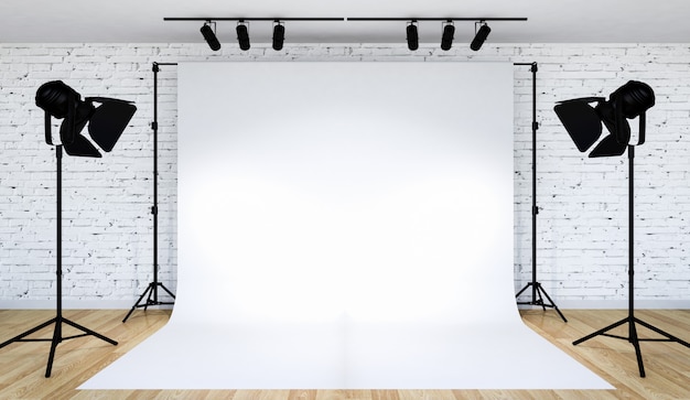 Photo studio lighting set up with white backdrop