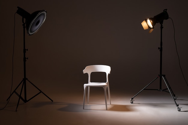 Photo studio with lighting equipment light scheme and chair The concept  of casting