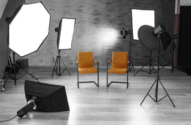 Photo photo studio with modern interior and lighting equipment