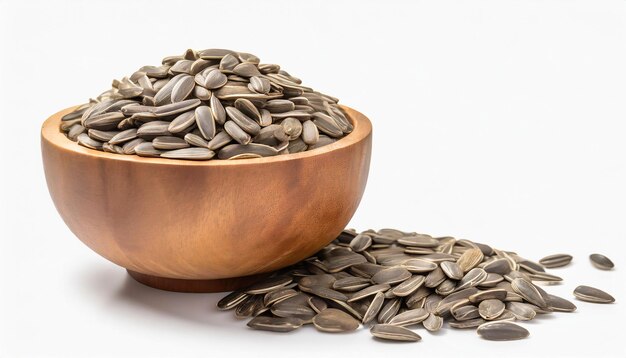 photo sunflower seeds in wooden bowl isolated on white background