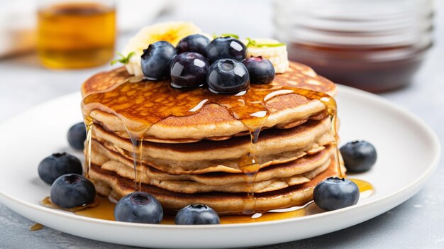 Photo of sweet homemade pancakes with stacked