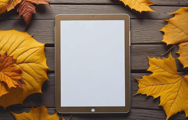 Photo tablet mockup and flower autumn leaves on the wooden background