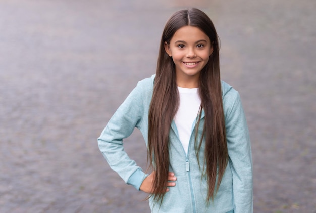 Photo of teen girl childhood portrait with long hair teen girl childhood concept