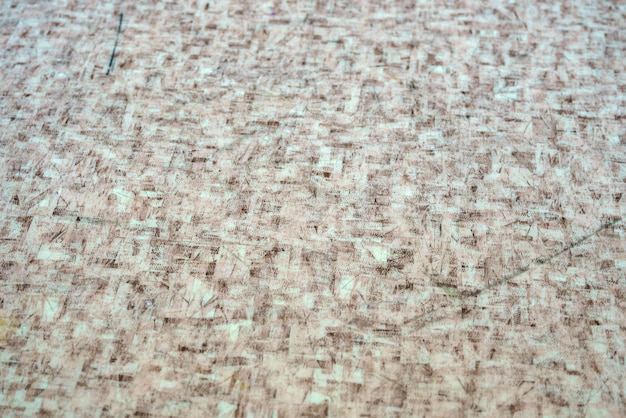 Photo of the texture of an old linoleum flooring