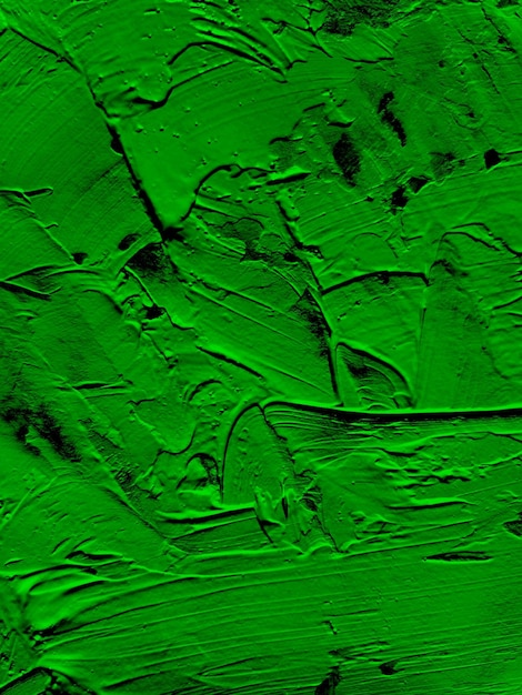 photo top view of abstract green paint brush strokes on surface