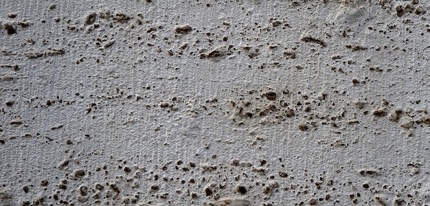 photo of vintage textured cement wall in house interior