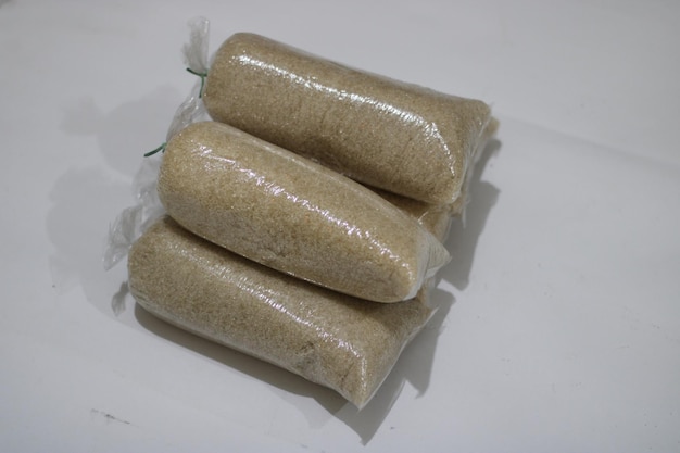 Photo of white granulated sugar in plastic wrap