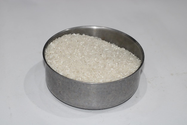 Photo of white rice on a small iron container