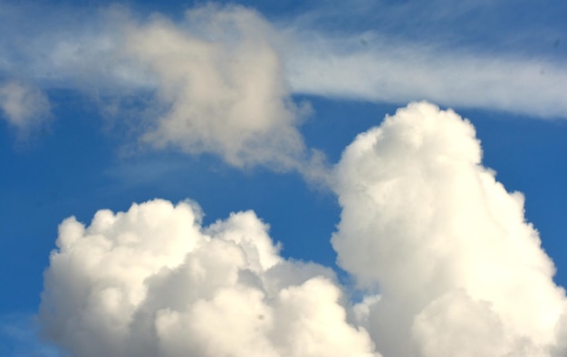 photo of white sky and bright blue clouds