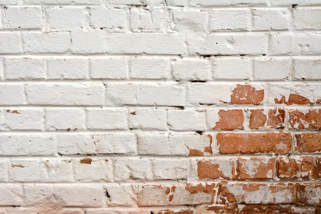 Photo of a whiteorange brick wall Abstract background