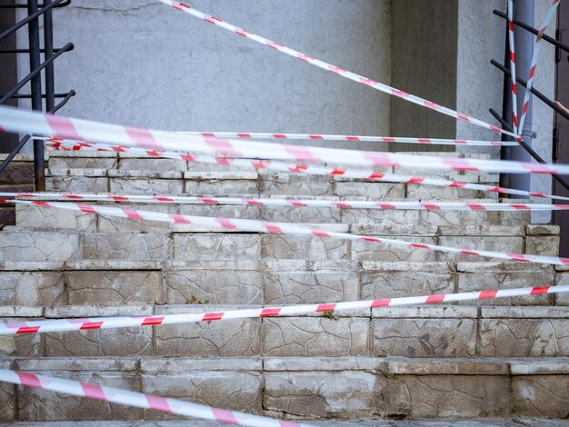 A photo with ribbons warning of danger