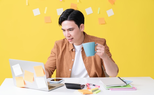 Photo of young Asian businessman working on background