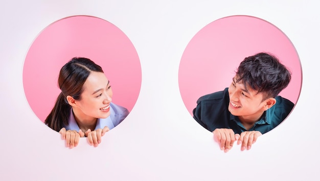 Photo of young Asian couple on background