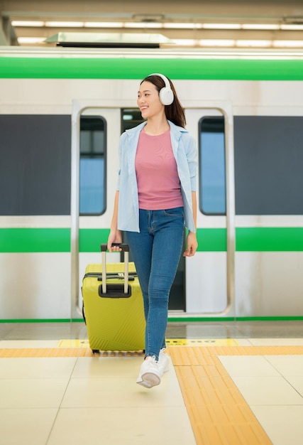 Photo of young Asian woman travel