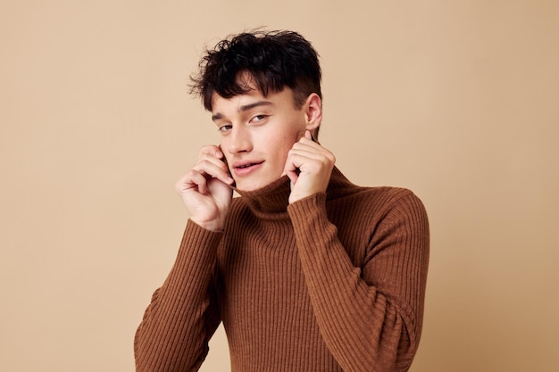 Photo young boyfriend brown turtleneck posing fashion isolated background unaltered