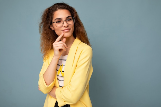 Photo of young positive thinking dreaming beautiful brunette curly woman with sincere emotions