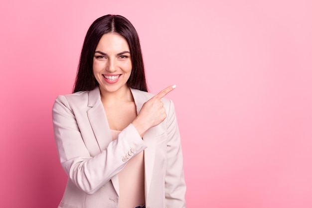 Photo of young pretty lady promoter indicate finger empty space promoter isolated over pastel color background