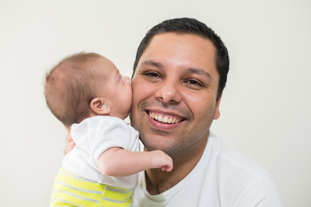 Photograph of father and his baby