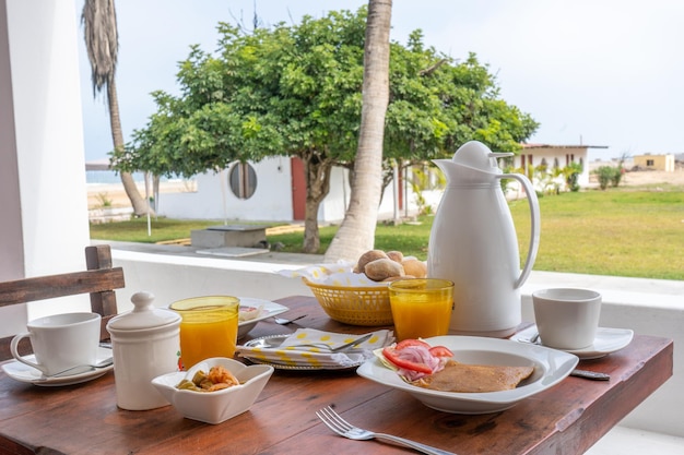 Photograph of gourmet breakfast at a restaurant table By Yuri Ugarte Cespedes