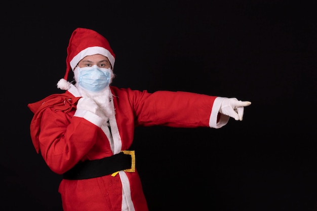 Photograph of man with dawn syndrome dressed as santa claus