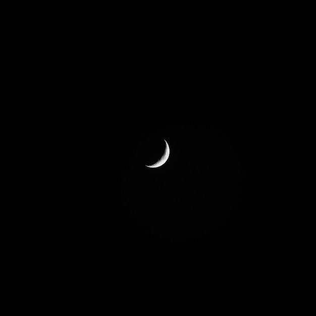 Premium Photo | Photograph of the moon on a black background