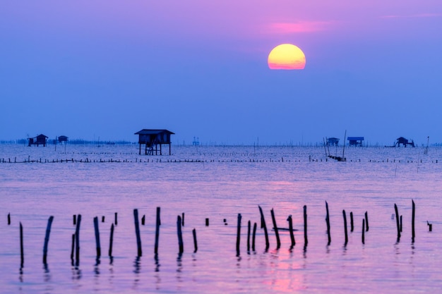 Photograph of the morning sea and bright blue gold