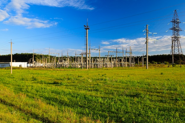 Photographed electric poles located in the countryside outside the city