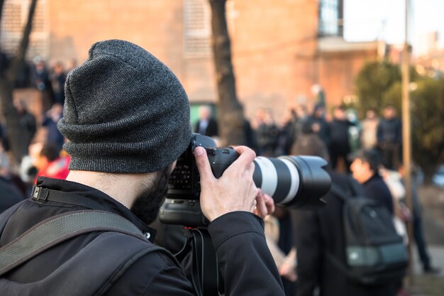 The photographer is taking pictures on street