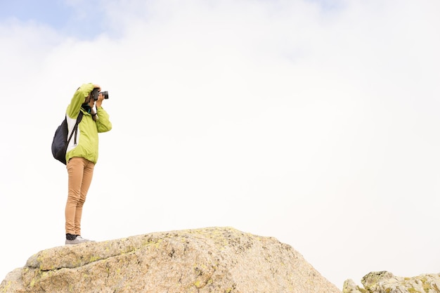 Photographer on a rock