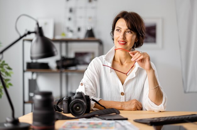 Photographer sitting at office