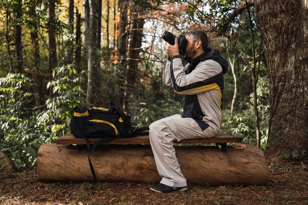 Photographer taking pictures in nature.