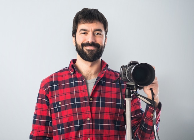 Photographer over white background